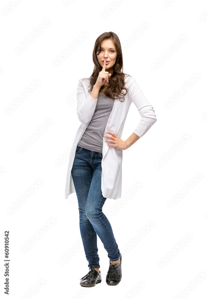 Full-length portrait of woman silence gesturing, isolated Full-length portrait of woman silence gesturing, isolated