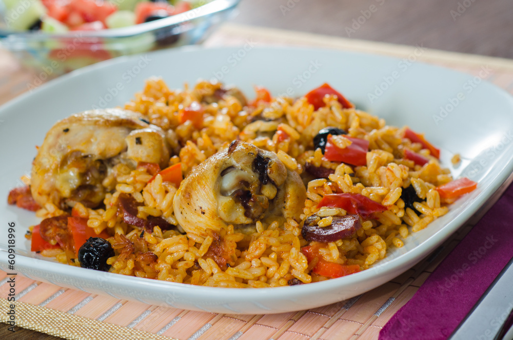 Oven chicken with rice, vegetables and black olives Oven chicken with rice, vegetables and black olives