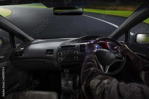 inside view of man driving passenger car on sharp curve mountain © stockphoto mania