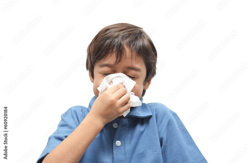 Sick little boy with tissue on white background Sick little boy with tissue on white background