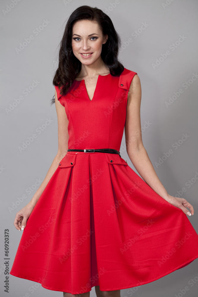 Fashion model in long red dress