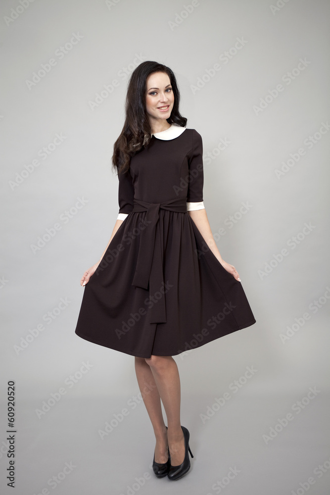 Beautiful professional model in dark brown dress Beautiful professional model in dark brown dress
