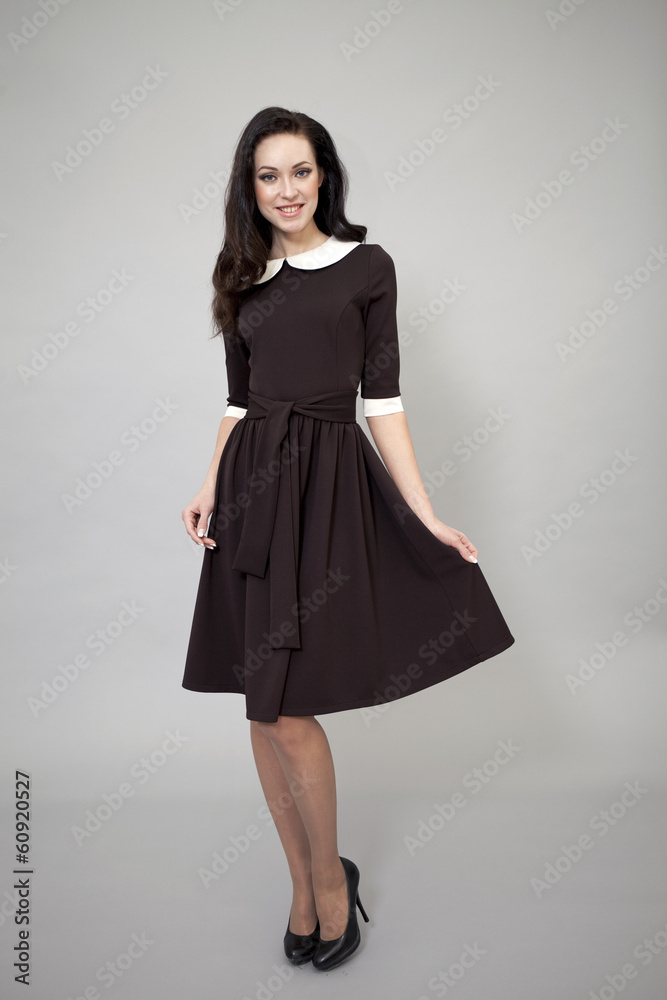 Beautiful professional model in dark brown dress Beautiful professional model in dark brown dress