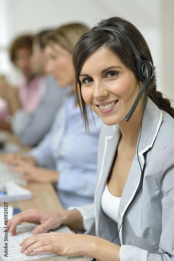 Beautiful smiling customer service representative Beautiful smiling customer service representative