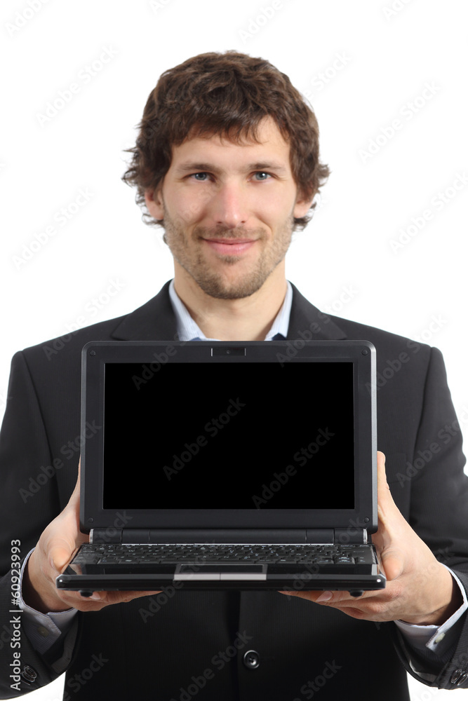 Attractive businessman showing a netbook screen app Attractive businessman showing a netbook screen app