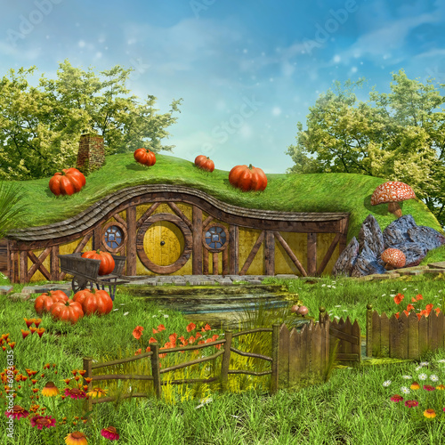 Fototapeta Zaczarowany domek na łące z kwiatami
