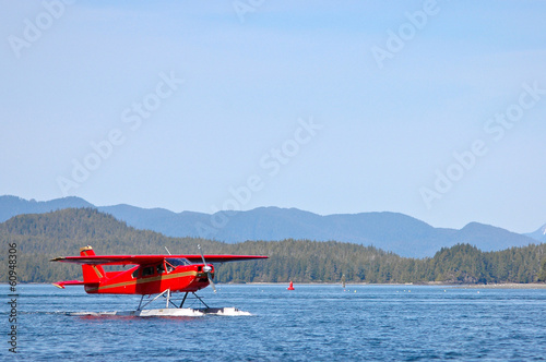 Canvastavla Red amphibious plane on a lake