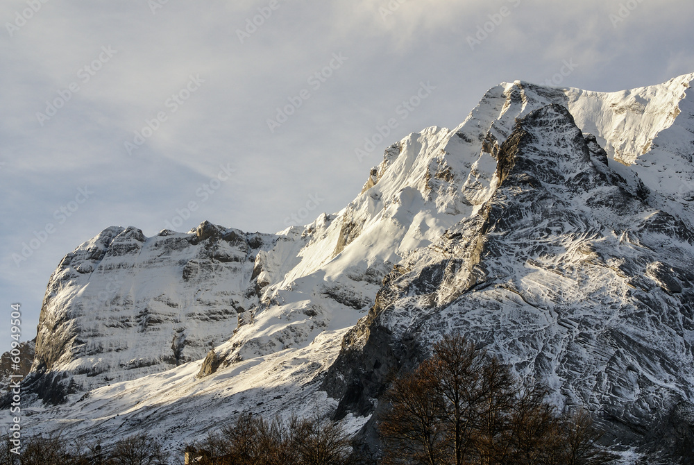 Snowy mountains and rocks at Gourette in the Pyrenees, France