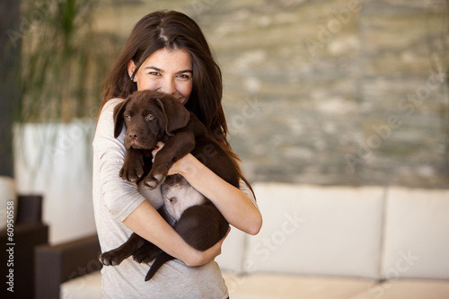Gorgeous young woman and her puppy © AntonioDiaz