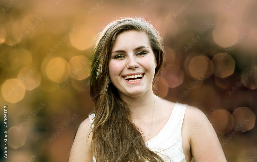 Happy girl on background of the bokeh Happy girl on background of the bokeh