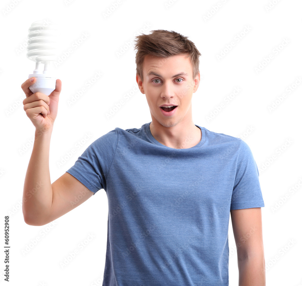 Young man with lamp energy saving, isolated on white Young man with lamp energy saving, isolated on white