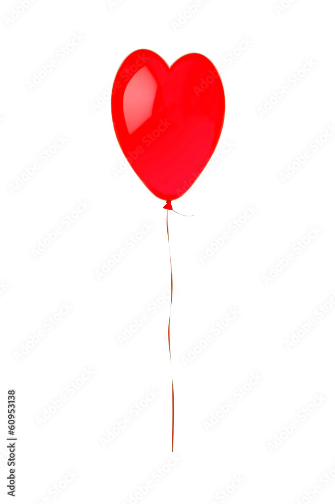 Red flying balloon looking like heart symbol isolated on white