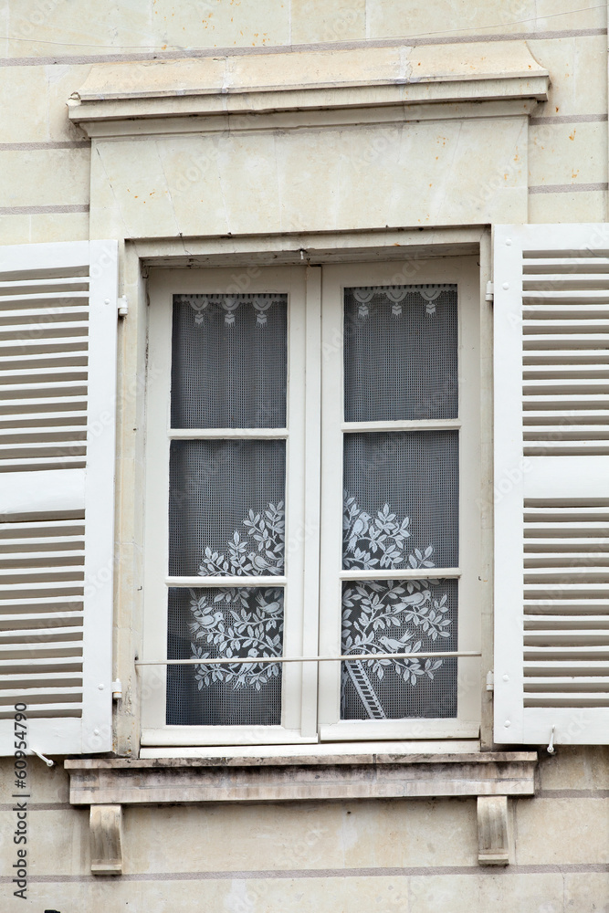 White window with shutters