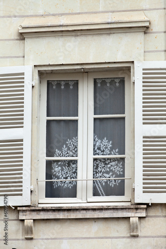 White window with shutters © wjarek