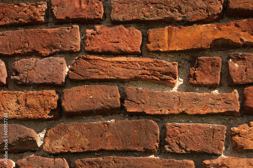 brick wall of the ruins of the old castle