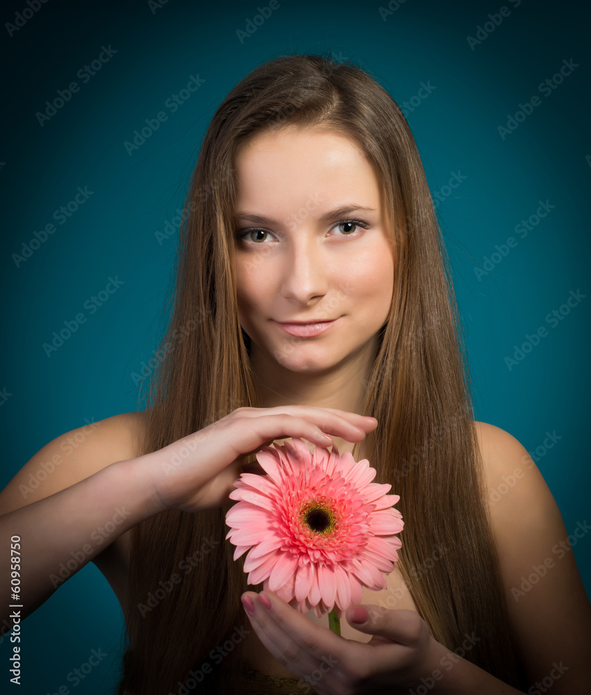 Beautiful girl with pink flower. Beautiful girl with pink flower.