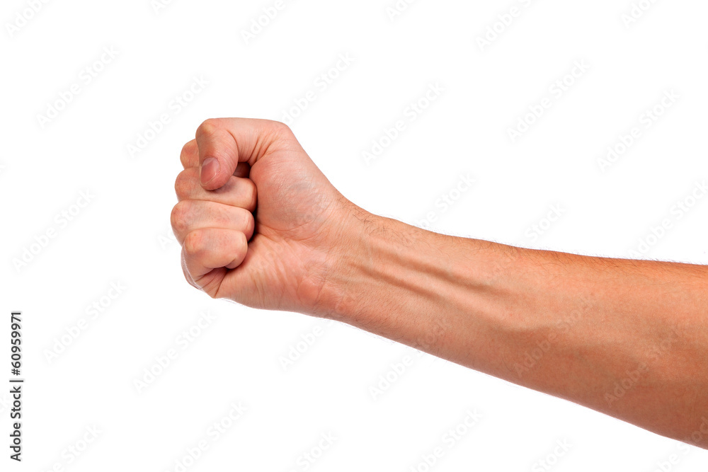 Males hand with a clenched fist isolated Males hand with a clenched fist isolated
