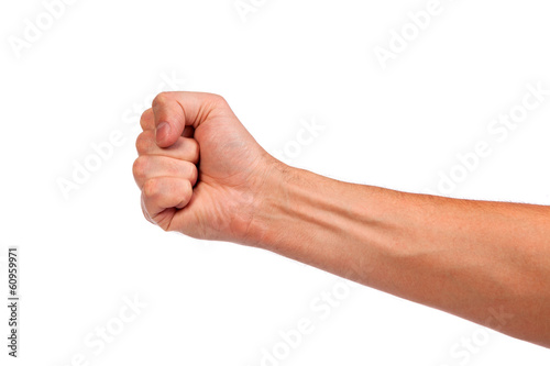 Males hand with a clenched fist isolated photo