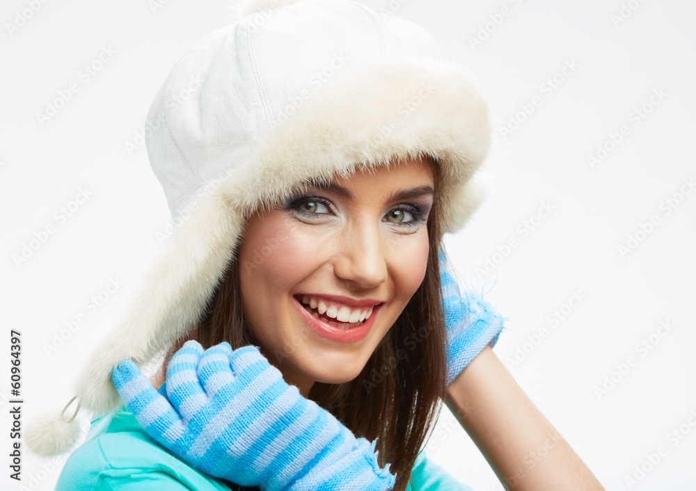 Beautiful woman winter hat. Close up portrait. Isolated white
