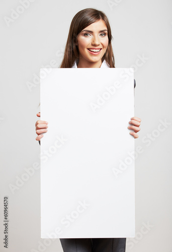 Portrait of young woman with blank white board