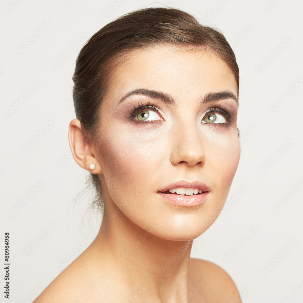 Beauty face of young woman isolated on white background. Beauty face of young woman isolated on white background.