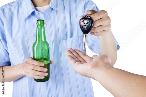 Obraz na plátně A drunk driver giving a car key to someone