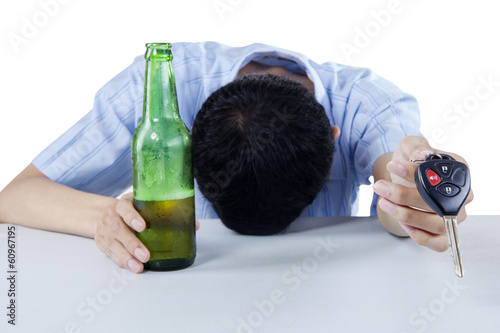Fotografie A drunk driver offering a car key