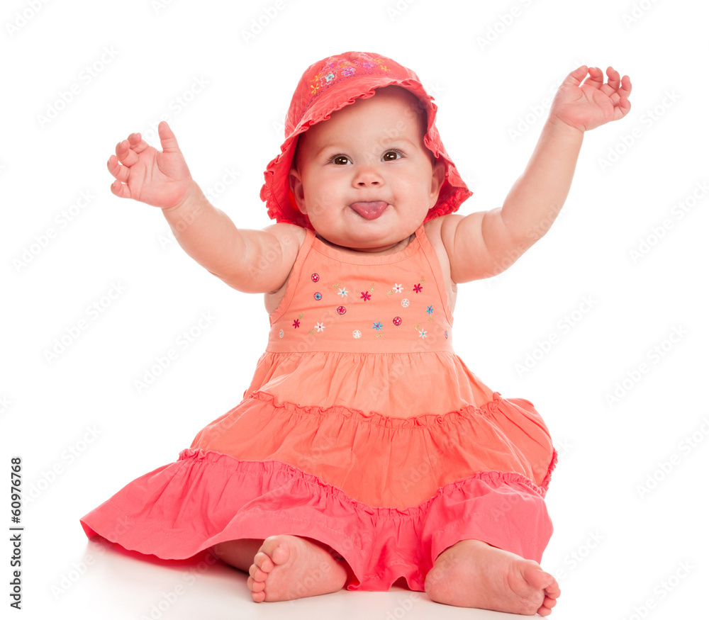 Beautiful suckling sits in flowered dress and hat Beautiful suckling sits in flowered dress and hat
