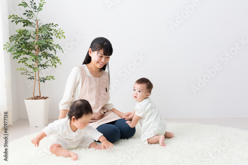 asian babys and mother in the room