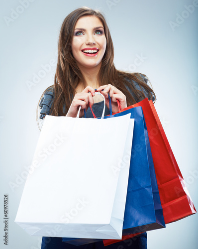  Portrait of happy smiling woman hold shopping bag. Female mode