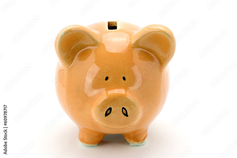 Pink piggy bank standing on a white background. Pink piggy bank standing on a white background.