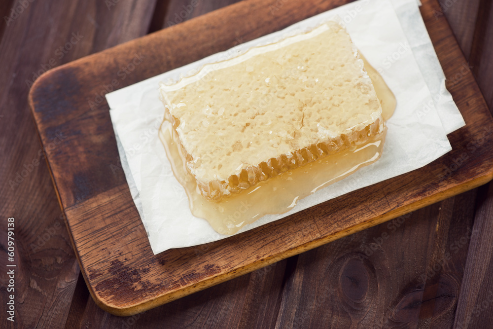 Above view of honeycomb, rustic wooden background Above view of honeycomb, rustic wooden background
