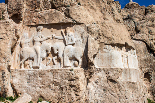 Naqsh-e Rustam, carving of the coronation of Ardashir I. Iran. photo