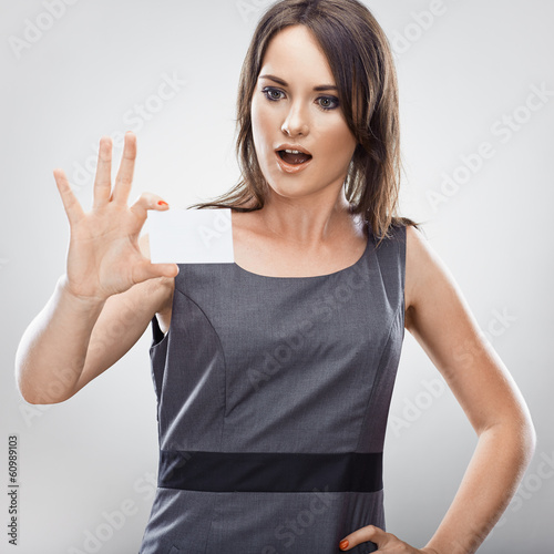 Business woman credit card hold. Gray dress business model posi photo