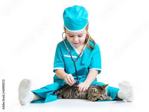 Child girl playing doctor w...