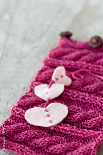 Knitting pattern  on a wooden background
