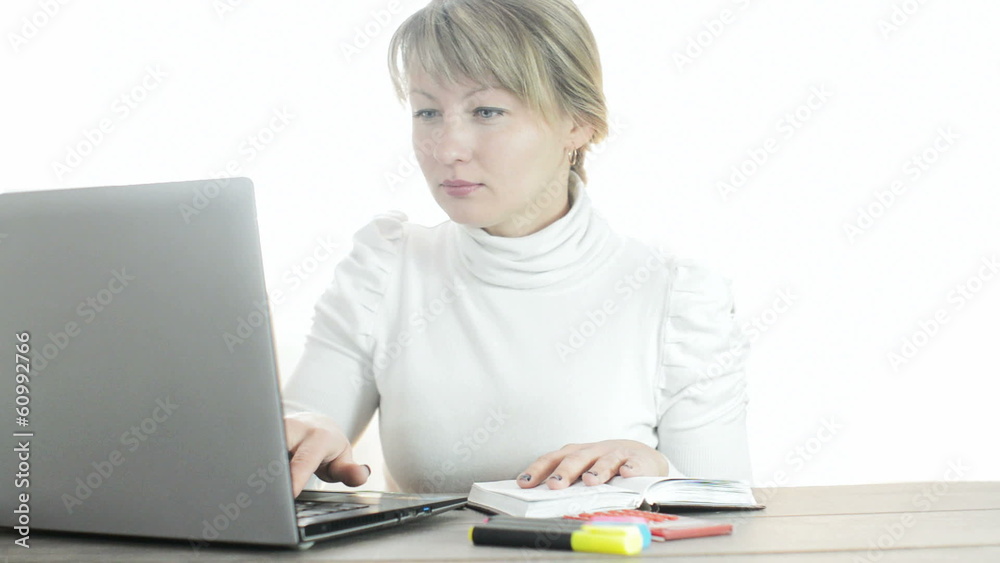 girl working at a laptop girl working at a laptop
