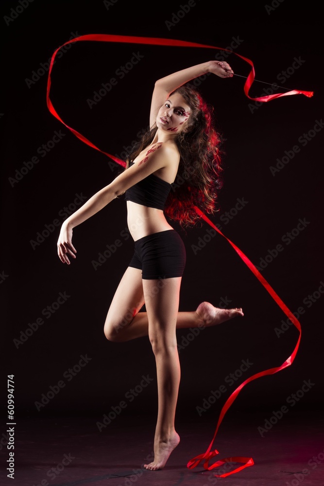 young girl dancing with fire