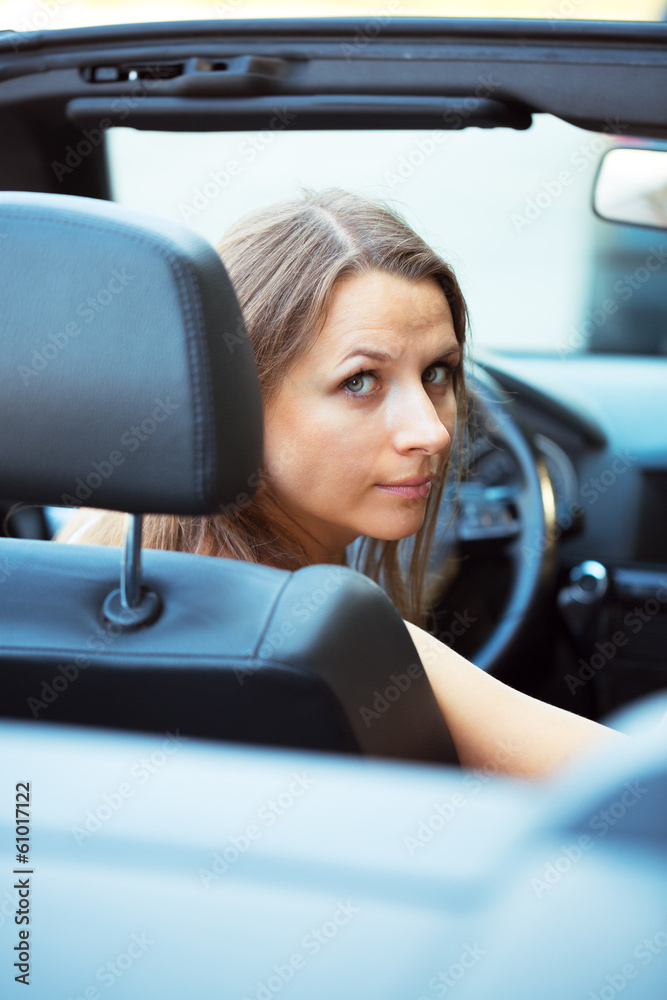 Caucasian woman in a car