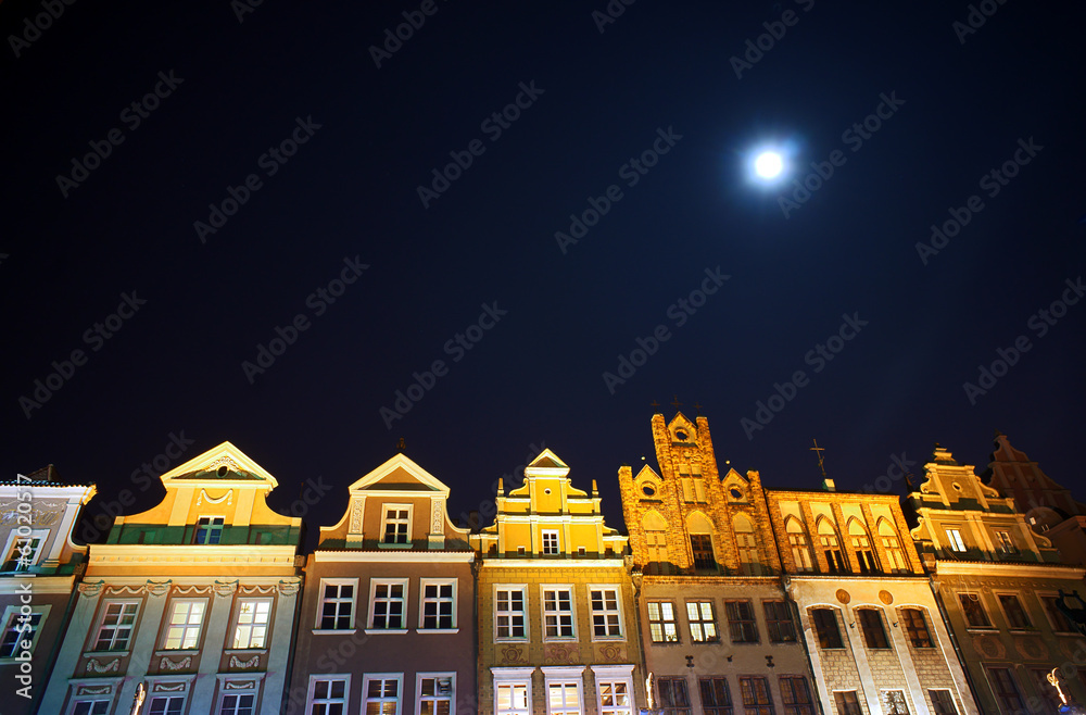 Fototapeta premium Houses on the market and the moon in Poznan, Poland .
