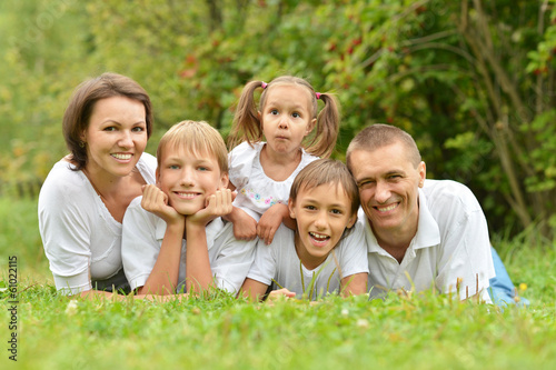 Happy family in summer park