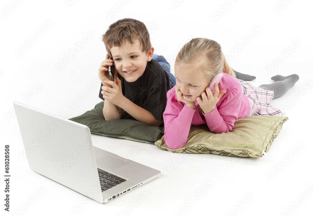 Children in business watching the Laptop and calling Children in business watching the Laptop and calling