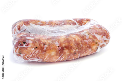 frozen spiced pork meat sausages photo