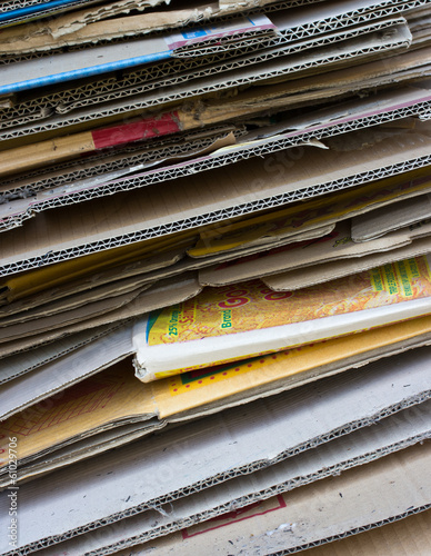 Old record carton covers stacked in pile