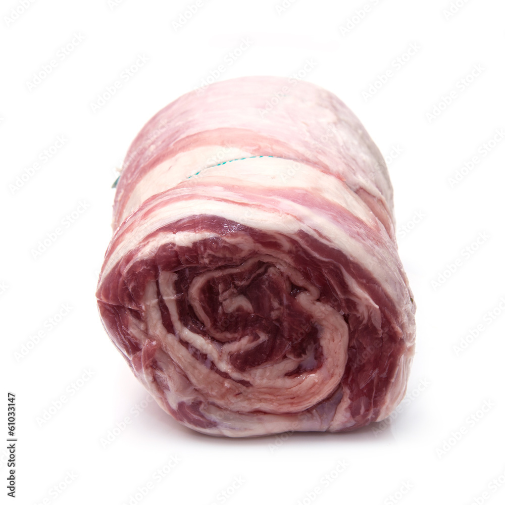 Rolled lamb breast joint,isolated on a white studio background. Rolled lamb breast joint,isolated on a white studio background.