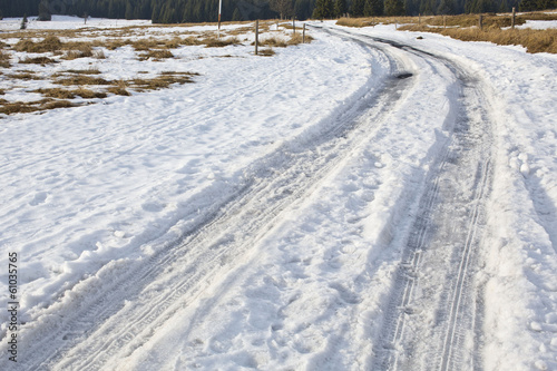 frozen winter asphalt road with snow © habrda