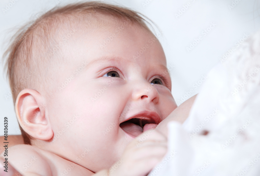 Mother breast feeding newborn baby Mother breast feeding newborn baby