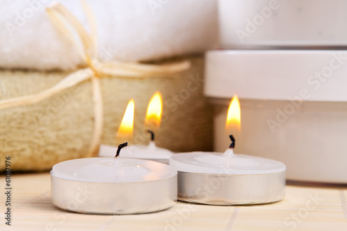 spa therapy  three burning candles