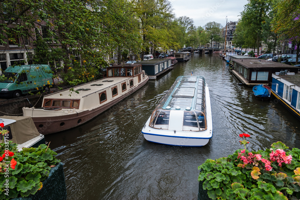 Traditional houseboats in Amsterdam, Netherlands Traditional houseboats in Amsterdam, Netherlands
