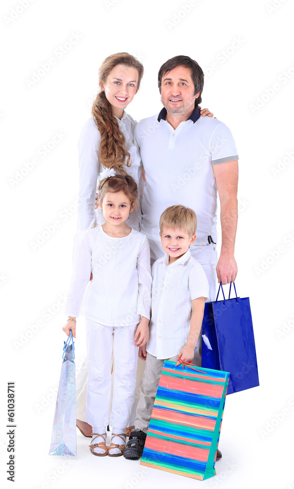Beautiful happy family - isolated over a white Beautiful happy family - isolated over a white
